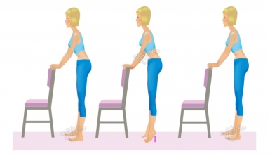 Person taking a standing stretch break near home office desk